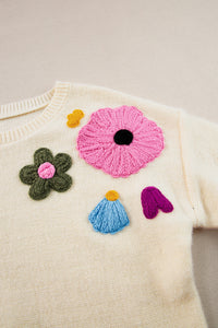 Anne - Strickpullover mit Blumenmuster und gerippten Kanten