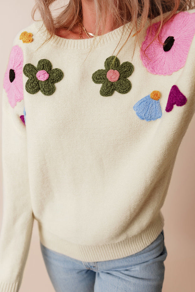 Anne - Strickpullover mit Blumenmuster und gerippten Kanten